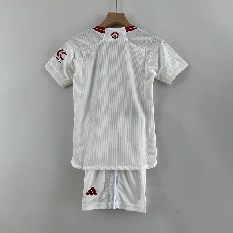 MANCHESTER UNITED II 23/24 CONJUNTO INFANTIL - TIENDA DEL JUGADOR